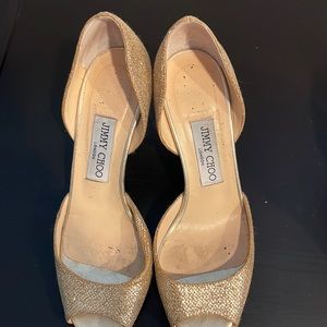 Gold Jimmy Choo heals